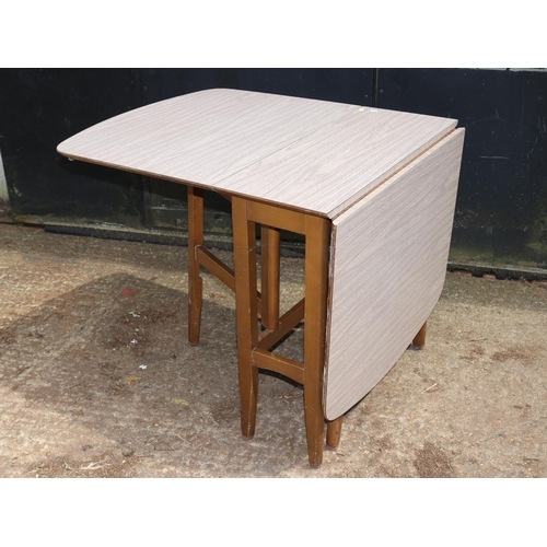 119 - Vintage Formica drop leaf table measures approx. 75cm x 34cm unextended (extended 150cm extended)