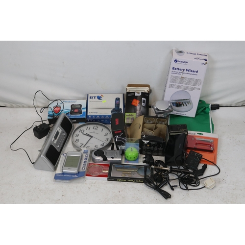 124 - Selection of mostly boxed goods to include BT phone, magnifier, stapler etc . Trade - spares or repa... 