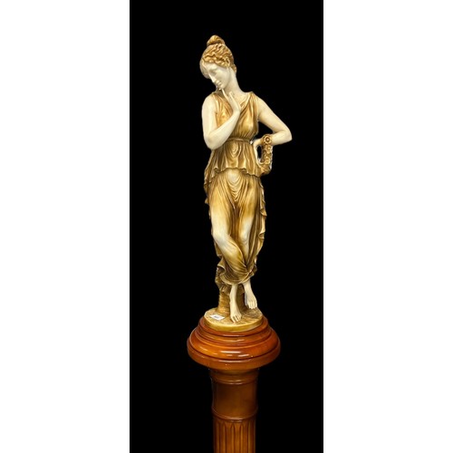 42A - Large resin carved Greek Goddess on marble style amber coloured plinth, together with a tall matchin... 