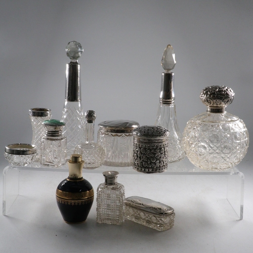 20 - Good selection of Silver topped and plated scent bottles.