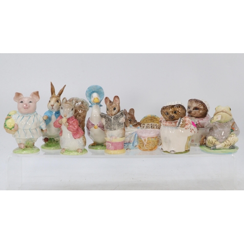 74 - Nine Beatrix Potter figures to include Jemima Puddleduck, Squirrel Nutkin, Little Pig Robinson and P... 