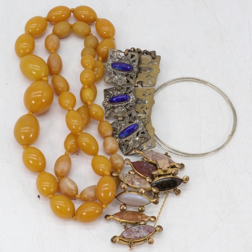 223 - Agate and gilt bracelet with one other and some amber? beads