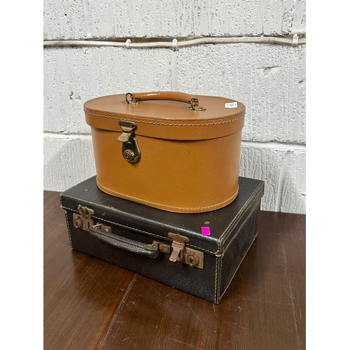 573 - Rexine attache case together with a pixie vanity case