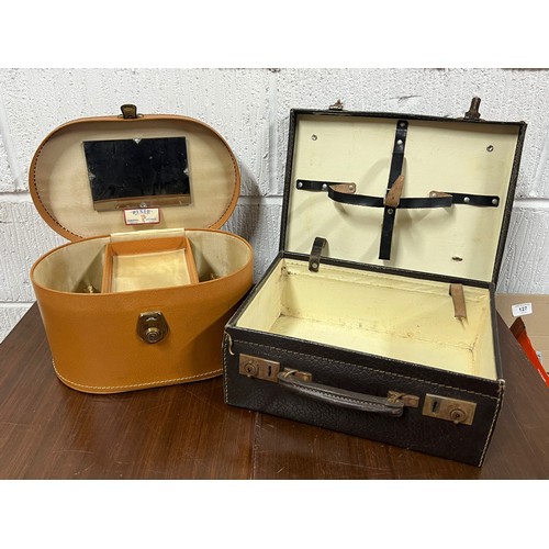 573 - Rexine attache case together with a pixie vanity case