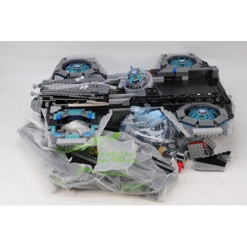 134 - Lego Marvel 76042 shield helicopter partially assembled in original box with five mini figures, unch... 