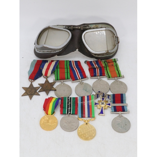 51 - WWII medal bar including 1939/45 France and German Star, Defence and War Medal together with another... 