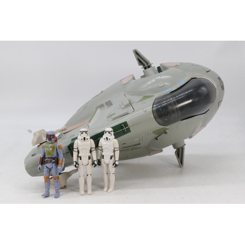 60 - Vintage Star Wars, Slave I vehicle, Together with Boba Fett, with weapon and two storm troopers.