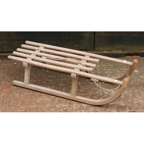 10 - Wooden toboggan