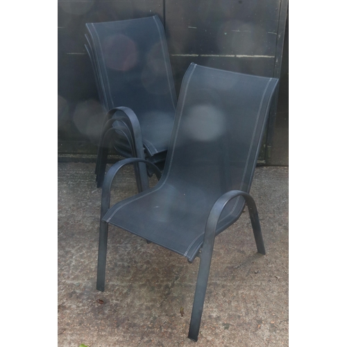 1A - Four stacking garden chairs, metal frames with polyester seats.