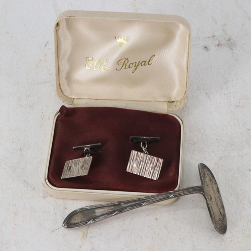 31 - Silver pair of cufflinks together with a silver hallmarked baby pusher