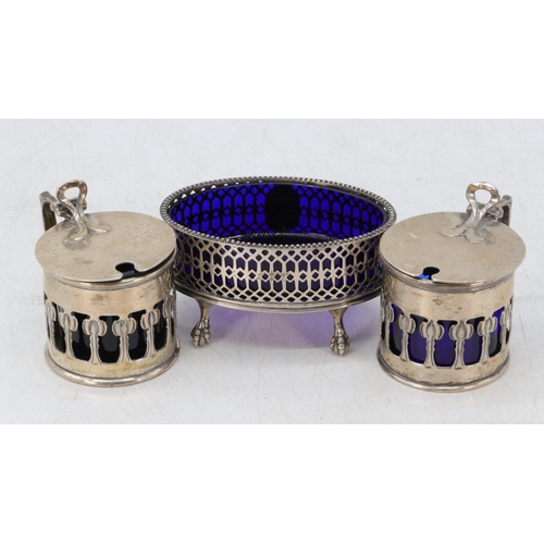 14 - Pair of silver Art Nouveau mustard pots, Birmingham 1902 together with a silver oval bon bon dish on... 