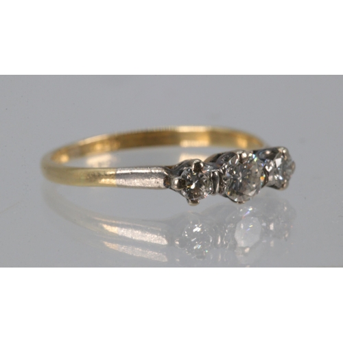 164 - 18ct gold three stone diamond ring