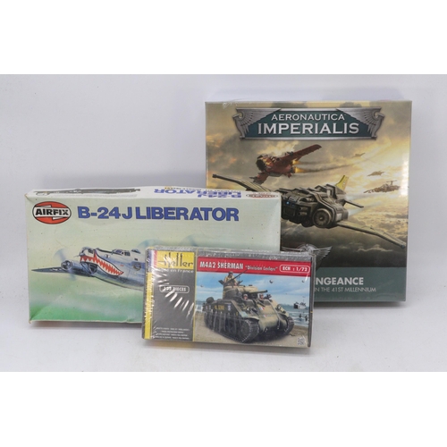 339 - Three boxed kits to include Airfix 1:72 model consolidated B-24J Liberator, Heller M4A2 Sherman 1:72... 