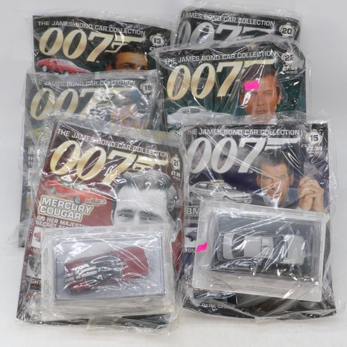 397 - Approx. 29 sealed James Bond diecast cars with magazines sealed