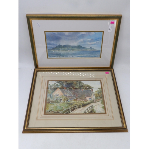 486 - Two framed and glazed watercolours one depicting a seascape and the other a cottage scene