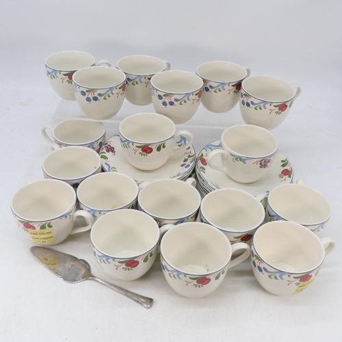 497 - Poole Pottery Cranborne pattern cups and some saucers