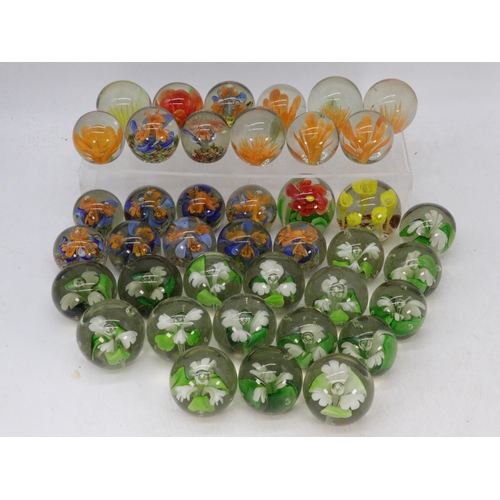 498 - A selection of glass paperweights