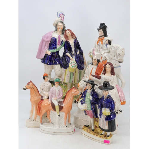 508 - A pair of Jockey Staffordshire figures (both with repairs heads) Flatback Gypsys and other figural g... 