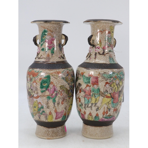 570 - Pair of oriental crackle glaze vases, one with noted repaired damage on lip approx. 24cm high