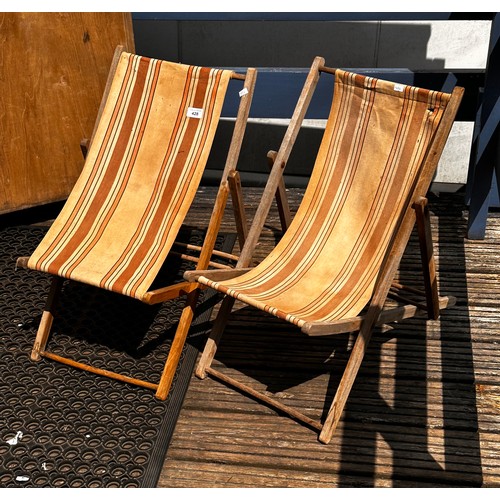 428 - Two vintage Childs deck chairs