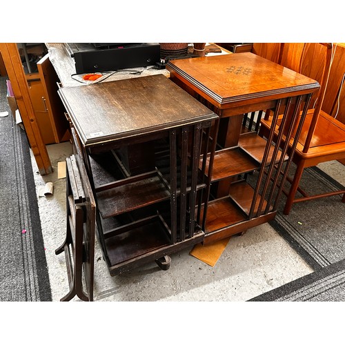 414 - An oak revolving bookcase, together with a walnut similar and a folding table