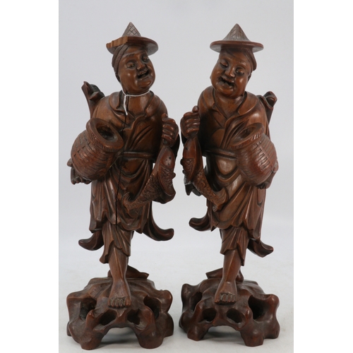 156 - Pair of Chinese carved fisherman statues, one with chip in cap (piece is still here)