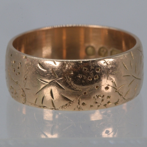 216 - 9ct gold band with etched decoration with two other rings , Gold ring weighs 5.9