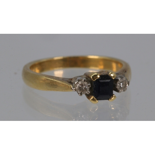 226 - 18ct Gold ring set with Sapphire and two diamonds