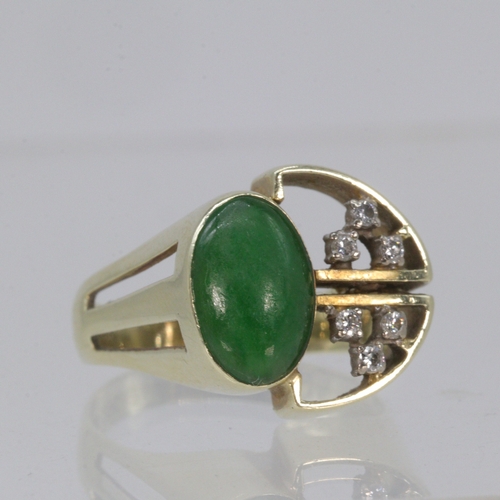 238 - Bespoke made 14ct gold ring set with six diamonds and an Imperial Jade gemstone. Size O
With origina... 