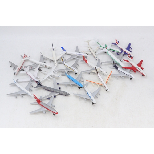 348 - Group of diecast airliners to include, Alitalia, Singapore Airlines, Trans World and more.