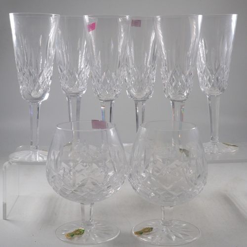 354 - Six Waterford champagne flutes, two Waterford brandy balloons, boxed  Waterford decanter and a box o... 