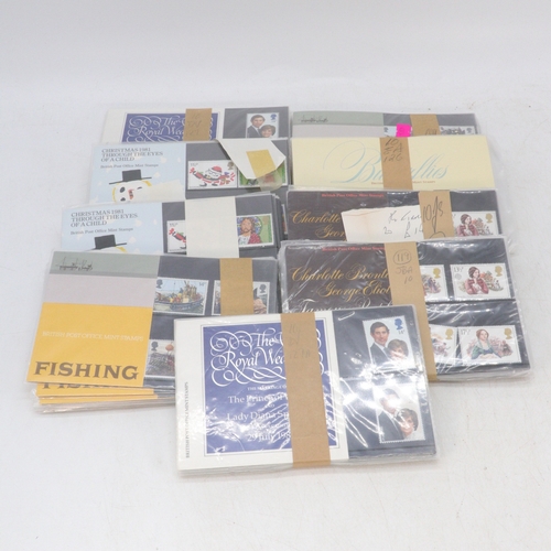 367 - A quantity of vintage presentation packs in bundles, including Christmas, Royal Wedding etc