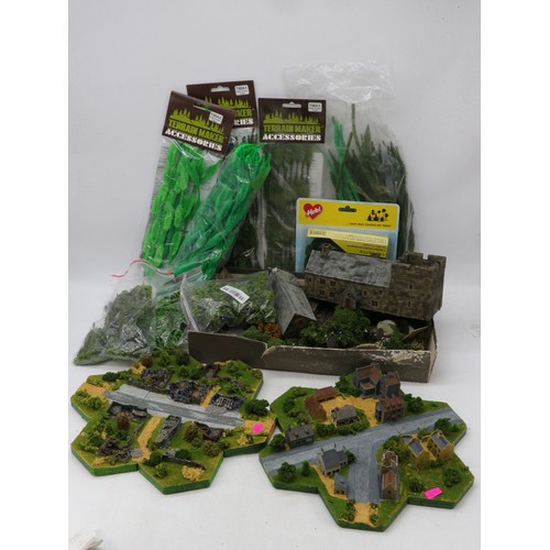 410 - Selection of 15mm buildings and scenery together with unused scenery and grass etc