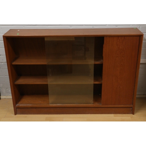 621 - Herbert Gibb bookcase with two glass sliding doors and an end cupboard, measures approx. 24cmd x 122... 