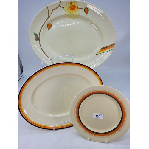 456 - Two Clarice Cliff platters together with a smaller plate similar