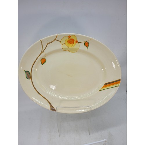 456 - Two Clarice Cliff platters together with a smaller plate similar