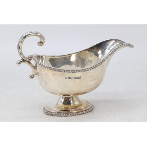 3 - A silver hallmarked sauce boat on raised oval foot (approx. 205g)