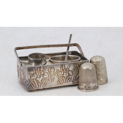 49 - Chinese silver miniature street vendors serving pot together with two silver thimbles