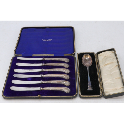 55 - Silver handled knife set and cased silver spoon