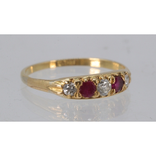 230 - 18ct gold ring set with three diamonds and two rubies? (2.3g)