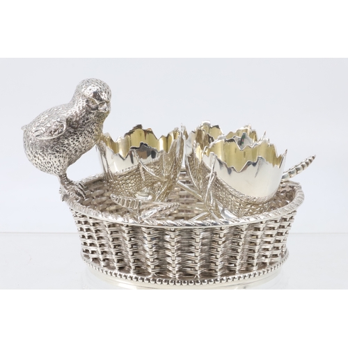 10 - Silver plated Mappin & Webb egg stand in the form of cracked chicken eggs and a chick standing on th... 