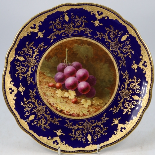 126 - A Coalport cabinet plate painted with still life of fruit, grapes, by F H Chivers within Cobalt and ... 