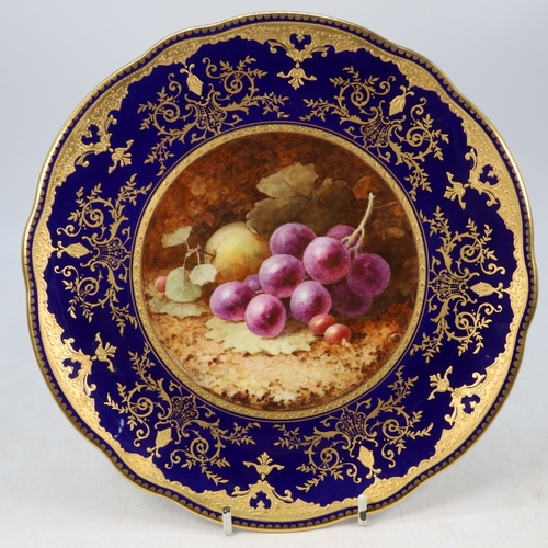 127 - A Coalport cabinet plate painted with still life of fruit, grapes, by F H Chivers within Cobalt and ... 