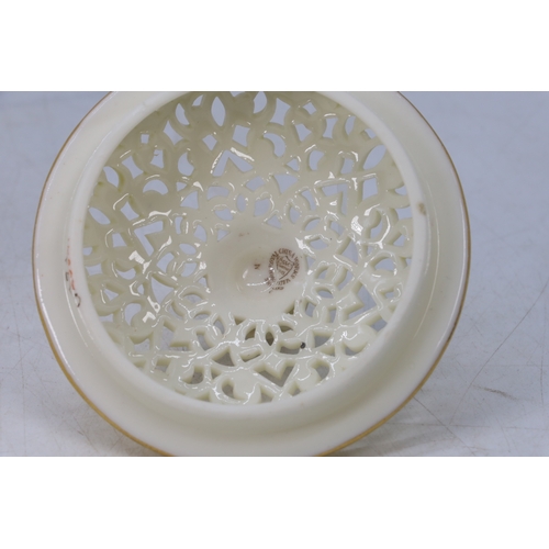 74 - Royal Worcester bowl set on legs with a fret-work lace base together with a lid, decorated  by Grain... 