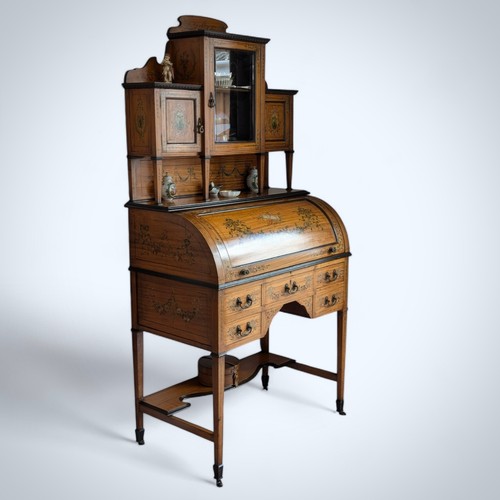 605 - Sheraton revival satinwood barrel bureau with raised top.