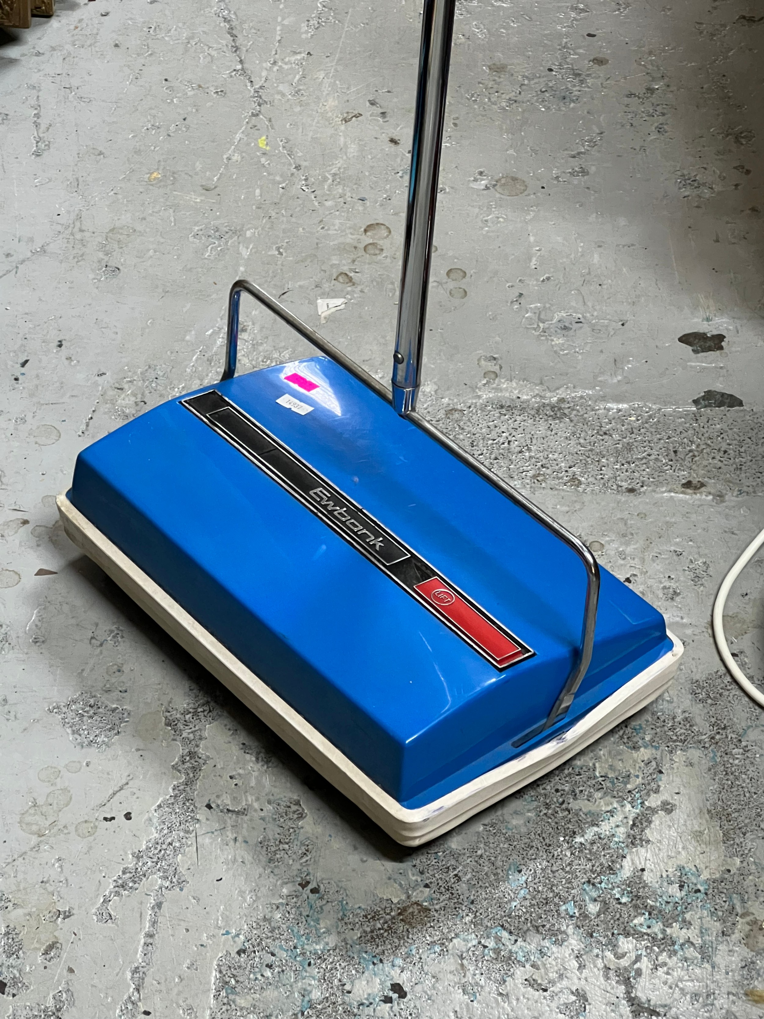 A vintage Ewbank carpet sweeper