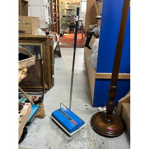 A vintage Ewbank carpet sweeper