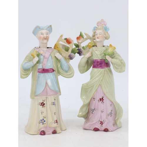 628 - A pair of late 19th century porcelain nodders