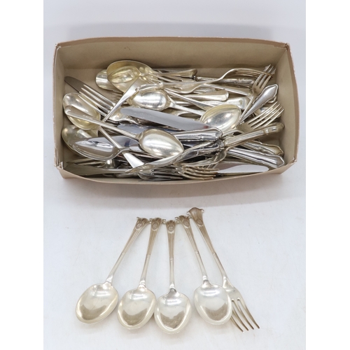 694 - Four silver dessert spoons and a similar fork together with a good selection of flatware / cutlery