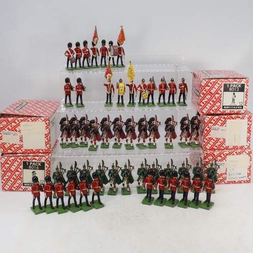 77 - Britains Marine Bass Drummer x 12 in trade box, together with Britain's Marine Drummer x 12, Scots G... 